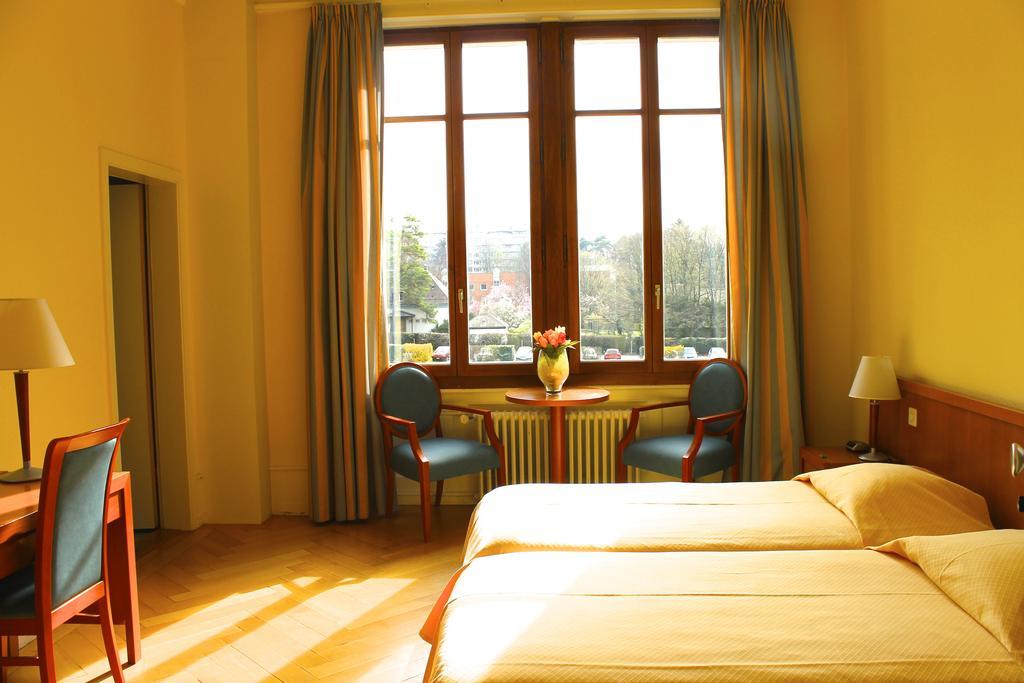 Hotel Le Cénacle Ginebra Habitación foto